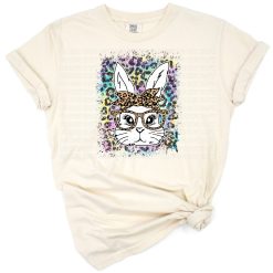 A colorful tie dye leopard print bunny with playful Easter accents.