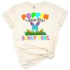 A cute pop it bunny character with Easter eggs and colorful accents