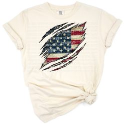 Ripped claw marks revealing the American flag with a bold and patriotic design.
