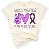 A purple ribbon symbol representing overdose awareness and support.