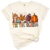 A cozy autumn design featuring pumpkins, football, and festive fall elements.