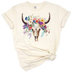 A watercolor painting of a longhorn bull skull with colorful country floral accents.