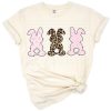Three cute girl bunny rabbits decorated with pink, leopard print, and polka dot patterns.