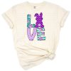 A cute bunny with purple and teal florals in a playful spring Easter design.