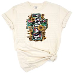 A western cross decorated with serape, cowhide, leopard patterns, and sunflowers in a rustic style.