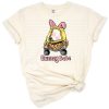 A cute pastel bunny with Easter accents in a retro colorful style.