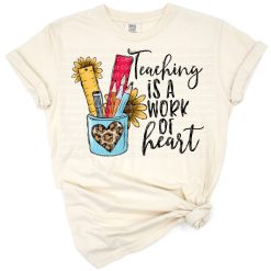 Colorful crayon heart artwork with a teaching quote in playful style.
