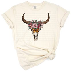 A boho Aztec-style western bull skull with decorative patterns and rustic elements.