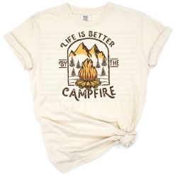 A retro styled mountain landscape with a glowing campfire under the night sky.