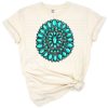 A boho-style turquoise gemstone with western accents in a distressed artistic look.