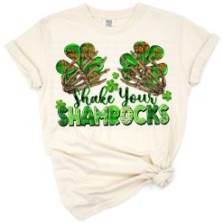 Skeleton hands holding green shamrocks in a playful St. Patrick's Day theme.