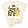 A distressed style design featuring the phrase Softball Sister with playful elements for little sisters.