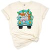 Hand drawn illustration of a cute bunny sitting in the back of an Easter truck with playful doodle style.