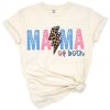 A distressed cheetah and leopard lightning bolt design with the word mom in a grunge boho style.