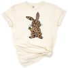 A cute Easter bunny with a leopard print pattern and festive accents.