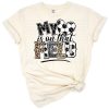A leopard print heart with a soccer ball and 'mom' text in a playful style.