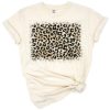 A distressed western leopard print background with vintage animal skin pattern.