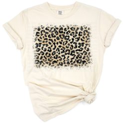 A distressed western leopard print background with vintage animal skin pattern.
