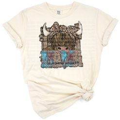 A boho illustration of a smiling highland cow with humorous mama heifer text.