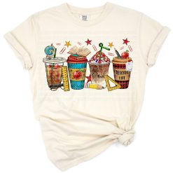 A group of colorful cartoon coffee cups with teacher-themed accents arranged in a playful pattern.