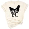 A chicken illustration decorated with floral elements in a farmhouse style.