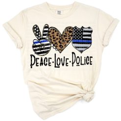 A grunge style design with peace sign, heart, and police themed graphics in blue and black.