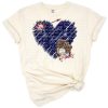 Navy blue faux glitter heart with a baseball pattern in the center