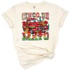 A vintage truck decorated in festive Mexican colors and patterns for Cinco de Mayo.