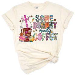 A cute Easter bunny holding a coffee cup with cheerful spring accents.