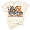 Illustration of an orange ribbon with peace, love, and cure symbols for leukemia awareness.