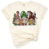 Hand drawn Christmas gnomes in a western holiday scene with festive accents.