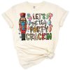 A festive western-style nutcracker character with Christmas decorations and cowboy elements.