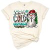 Pink lettering reading 'Baby It's Cold Outside' in a cute winter style with snowflake accents.