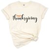 A festive Happy Thanksgiving text surrounded by autumn leaves and seasonal elements.