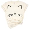 Illustration of a cute kitty cat face with big eyes and prominent whiskers.