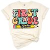 Retro styled first grade crew with playful lettering and vintage elements
