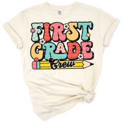 Retro styled first grade crew with playful lettering and vintage elements