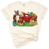A vintage truck filled with cute farm animals in a country setting.