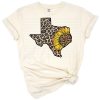 A Texas state silhouette filled with leopard print and decorated with bright sunflowers.