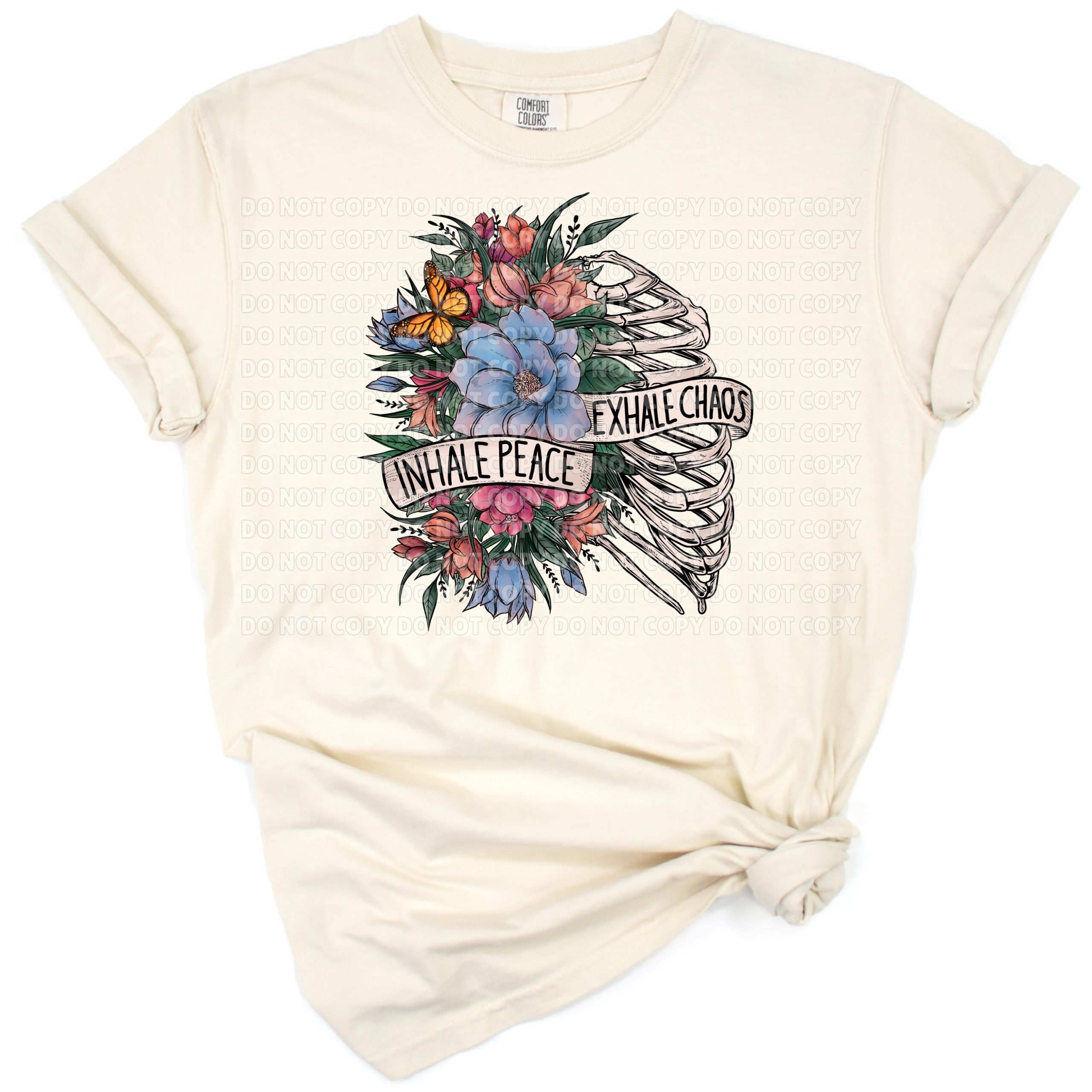 A flower skull and butterfly artwork with a peaceful, motivational theme.