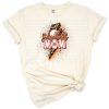 An orange baseball with cheetah print and the word Mom in a vintage style.