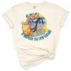 Retro design of sun, sand, and a drink in hand with beach waves and cheerful summer elements.