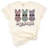Three pastel Easter bunnies wearing sunglasses in a playful and cute design.