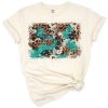 Distressed western design with cowhide, turquoise glitter, and leopard print background.