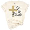 Hand-lettered He is Risen text with a Christian cross and Easter-themed decorative elements.