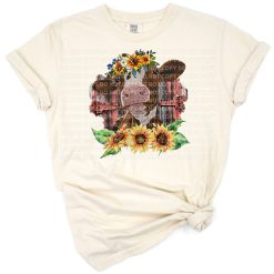 A watercolor-style cow with sunflowers surrounded by farm animal elements.