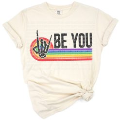 A colorful rainbow skeleton in retro vintage style with pride elements.