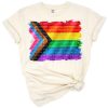 A vibrant rainbow pride flag background with bold, colorful stripes symbolizing inclusivity and love.