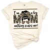 Camo themed distressed text graphic that says 'I'm a boy mom nothing scares me'.