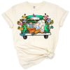 A playful bunny sits in a vintage truck decorated with Easter eggs and spring flowers.